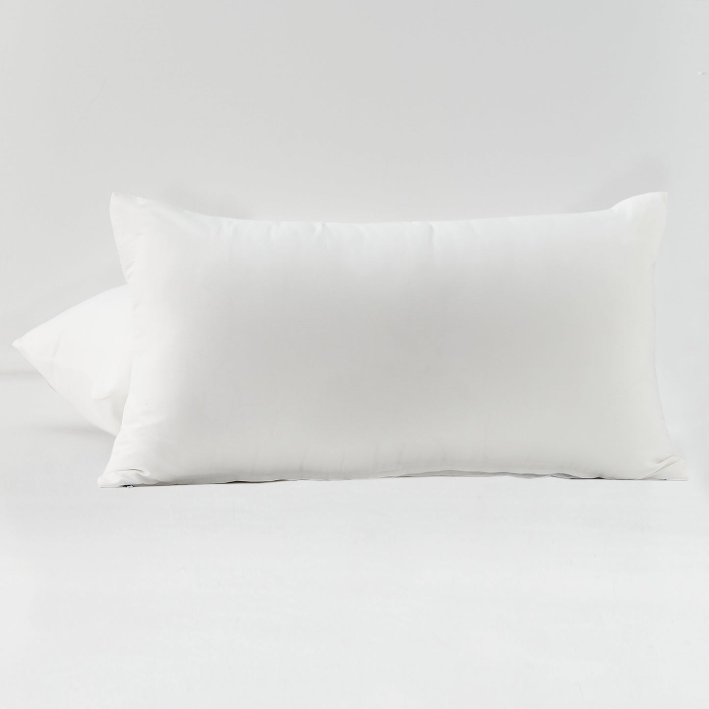 Two pillowcases made of ultra-fine microfiber solid color brushed fabric, fashioned from 100% polyester, perfect for the bedroom. Set includes 2 pillowcases.