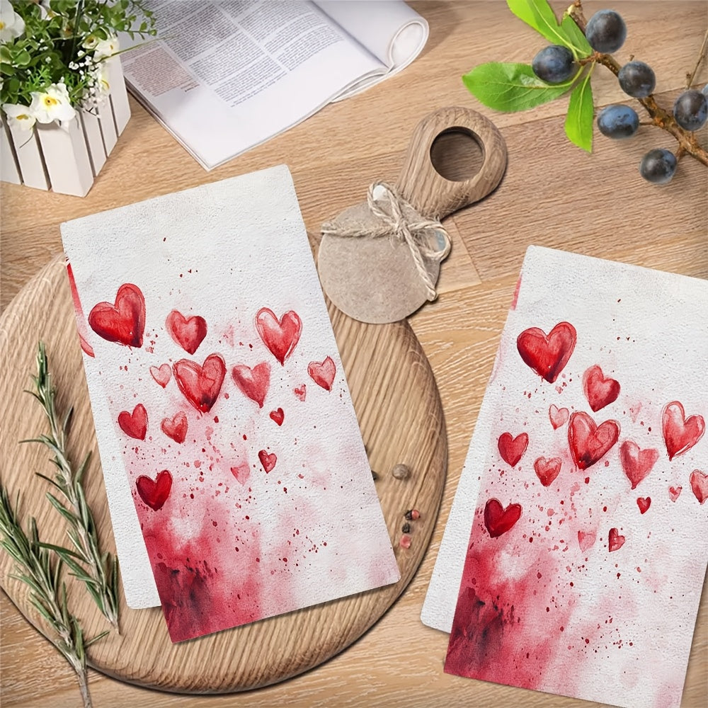 Set of 2 Valentine's Day Kitchen Towels, featuring 'Love At First Swipe' Hearts design. These Ultra Soft and Highly Absorbent Dish Hand Towels are perfect for holiday decor. Machine washable, each towel measures 16x24 inches. Item number: 2KYSYS1217559