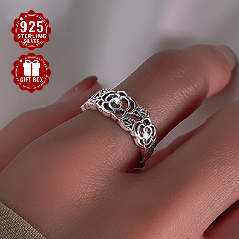 Retro sterling silver ring featuring a hollow rose flower design with an ethnic flair, perfect for literary-inspired ladies looking to add a unique touch to their daily or party outfits. Lightweight at about 2.5g.