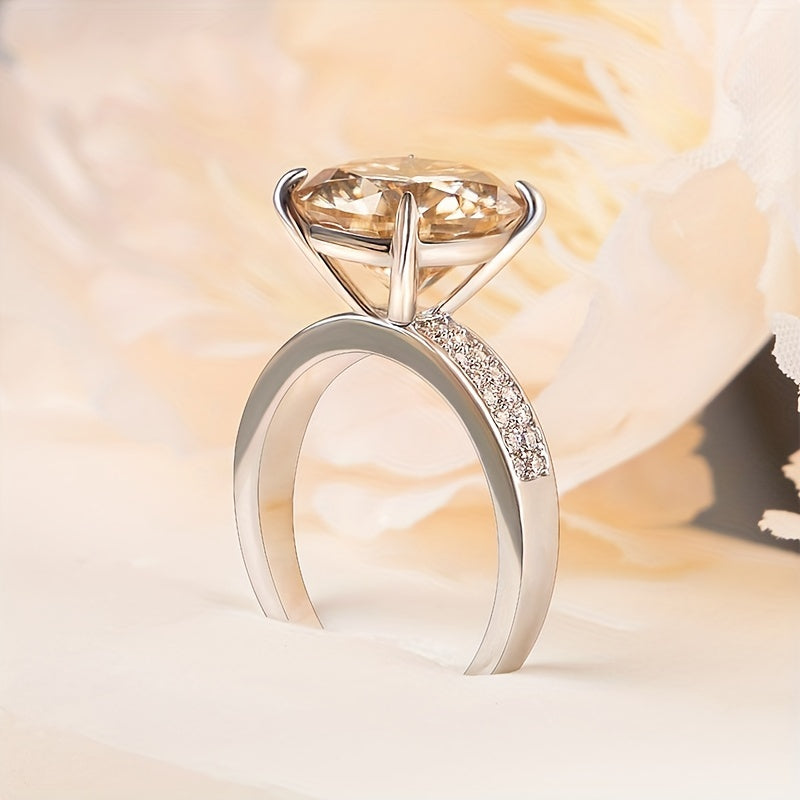 A stunning 5ct Moissanite ring crafted in 925 Sterling Silver, available in multiple colors. This high-quality jewelry piece is perfect for engagement and wedding scenes. Comes with a certificate of authenticity and gift box.