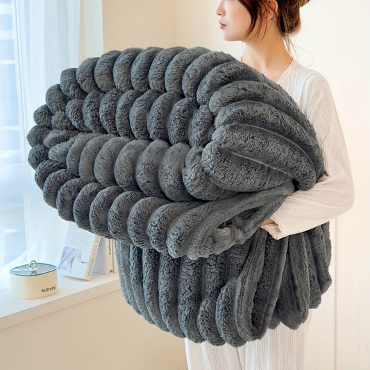 Indulge in the soft, warmth, and comfort of this luxurious faux rabbit fur blanket. This versatile blanket is perfect for napping, keeping cozy in air-conditioned rooms, or using as a plush shawl at the office. Whether you're camping or cuddling up at