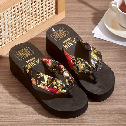 Floral print wedge flip flops with soft EVA sole, perfect for summer outings and holidays. Comfortable and stylish beachwear.