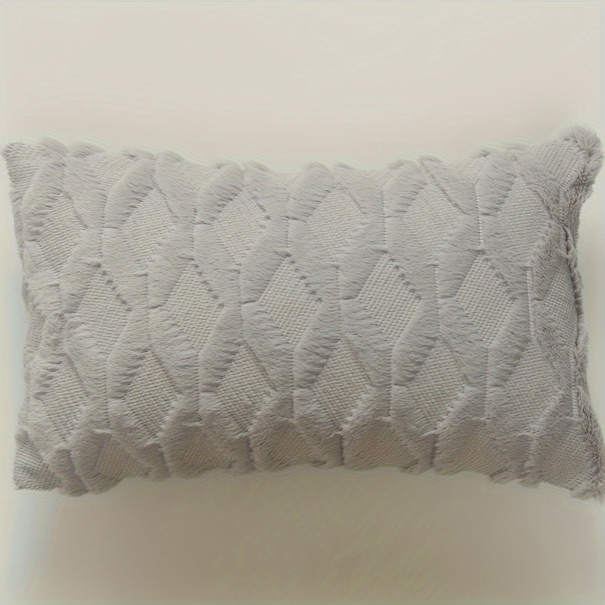 Indulge in the luxurious comfort of our Ultra-Soft Plush Diamond Quilted Throw Pillow Cover. Featuring a solid color back and a zip closure for easy removal, this cozy and comfortable cover is the perfect addition to your living room, bedroom, or sofa