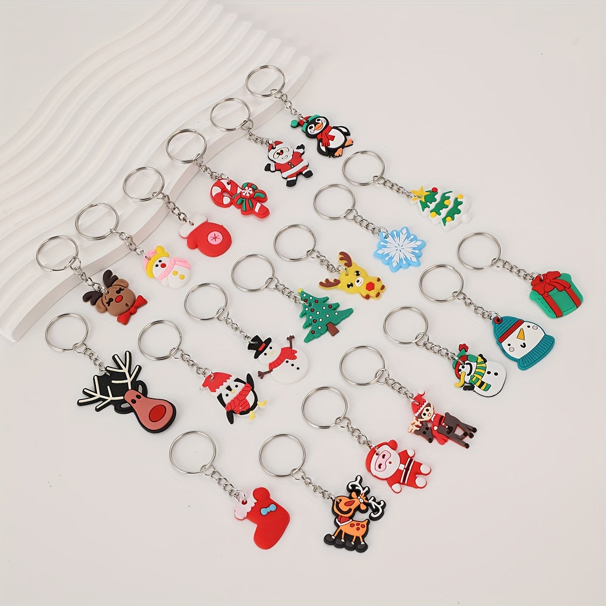 Christmas Cartoon Keychain Set includes 20 pieces - Adorable Anime and Holiday Charms for Bags, Backpacks, and Car Keys - Ideal Present for Women and Girls.