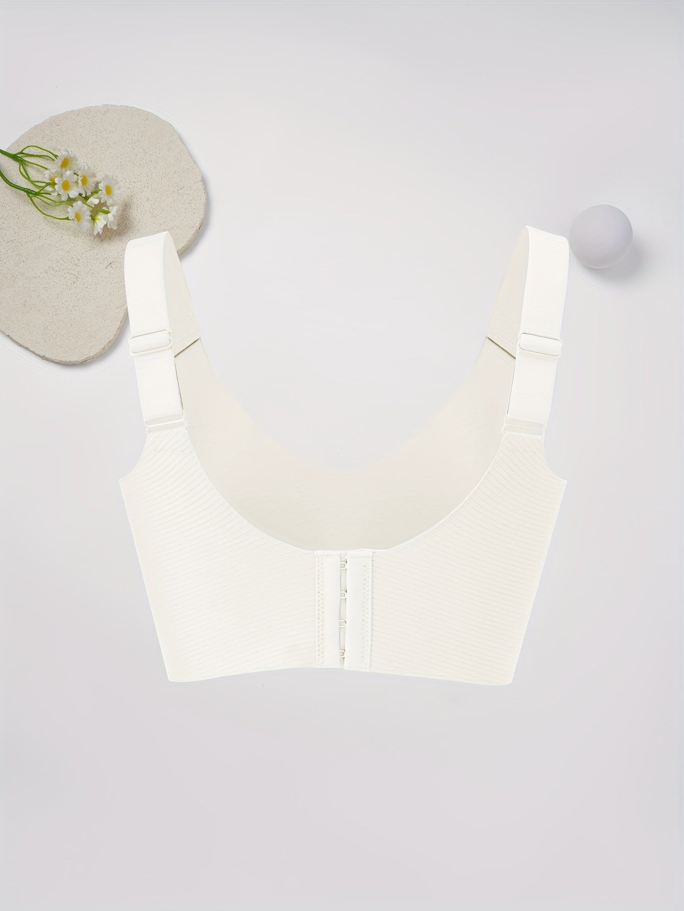 Elegant solid color bralette with soft support and medium support, made of comfortable knit fabric with wide straps.