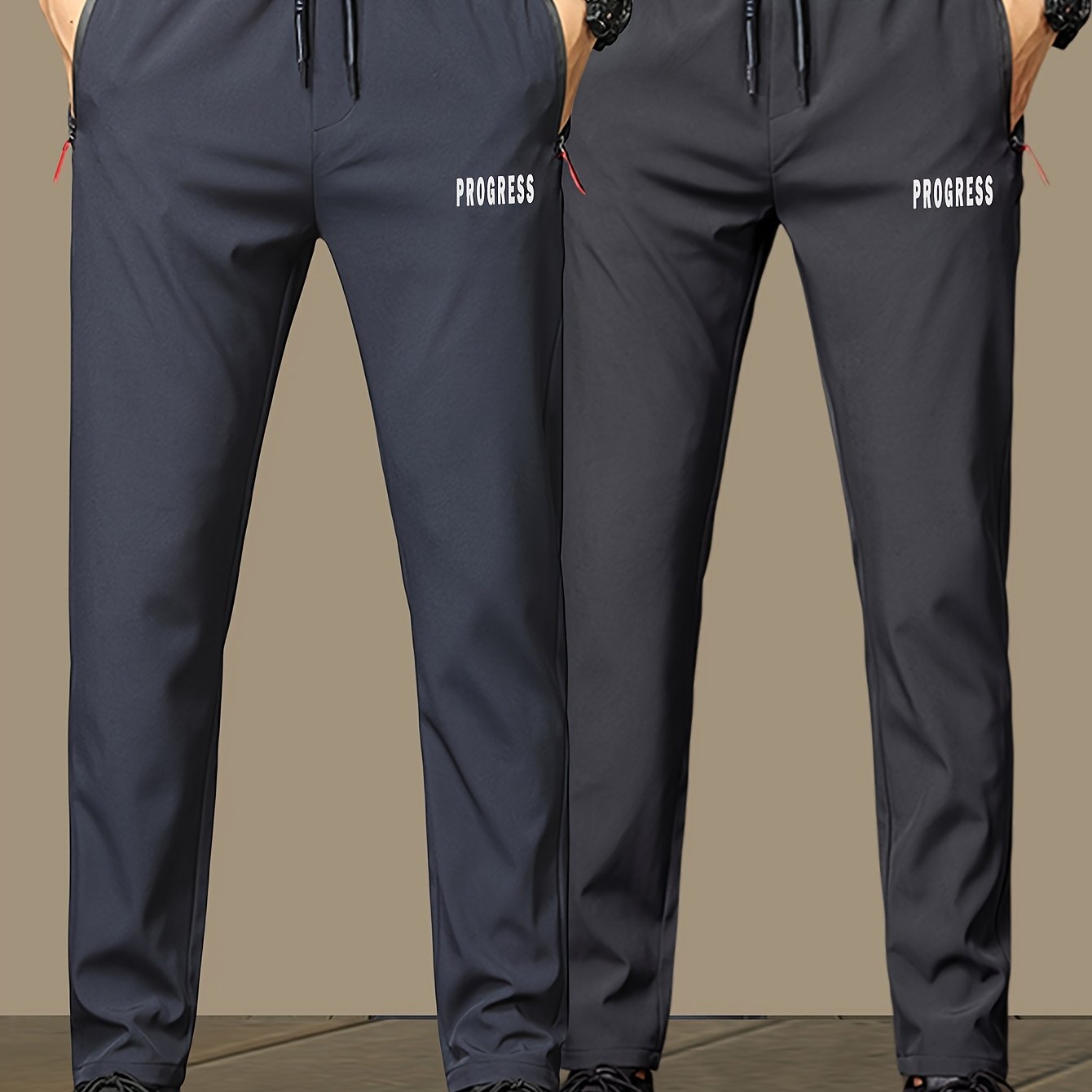 2pcs Men's Lightweight Joggers with "PRINCESS" print, quick-dry polyester, drawstring waist, zipper pockets, and adjustable comfort for casual attire.