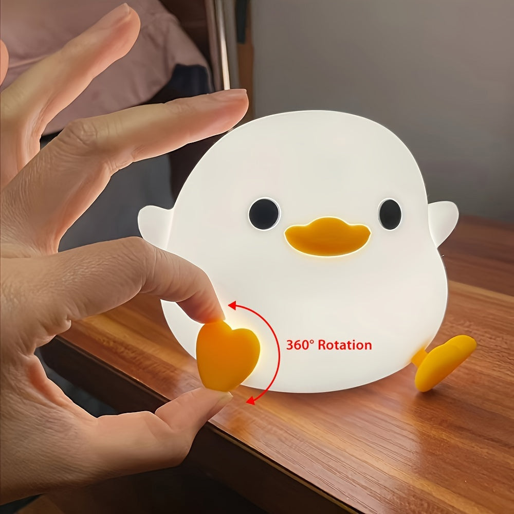 Cute duck-shaped touch control night light with RGB color changing, soft silicone bedside lamp, USB-C rechargeable desk light, perfect gift for any room.