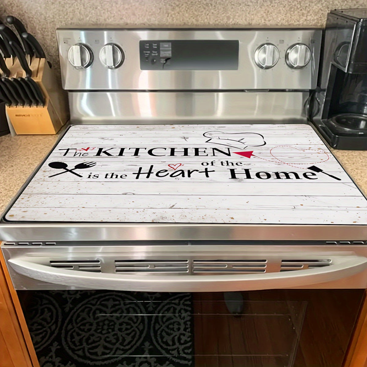 Protect your electric glass stove with our Extra Large 72.39x52.07cm Stove Top Cover. This anti-slip, waterproof, and heat resistant mat prevents scratching and serves as a versatile cooktop protector. Easy to clean and perfect for adding a decorative