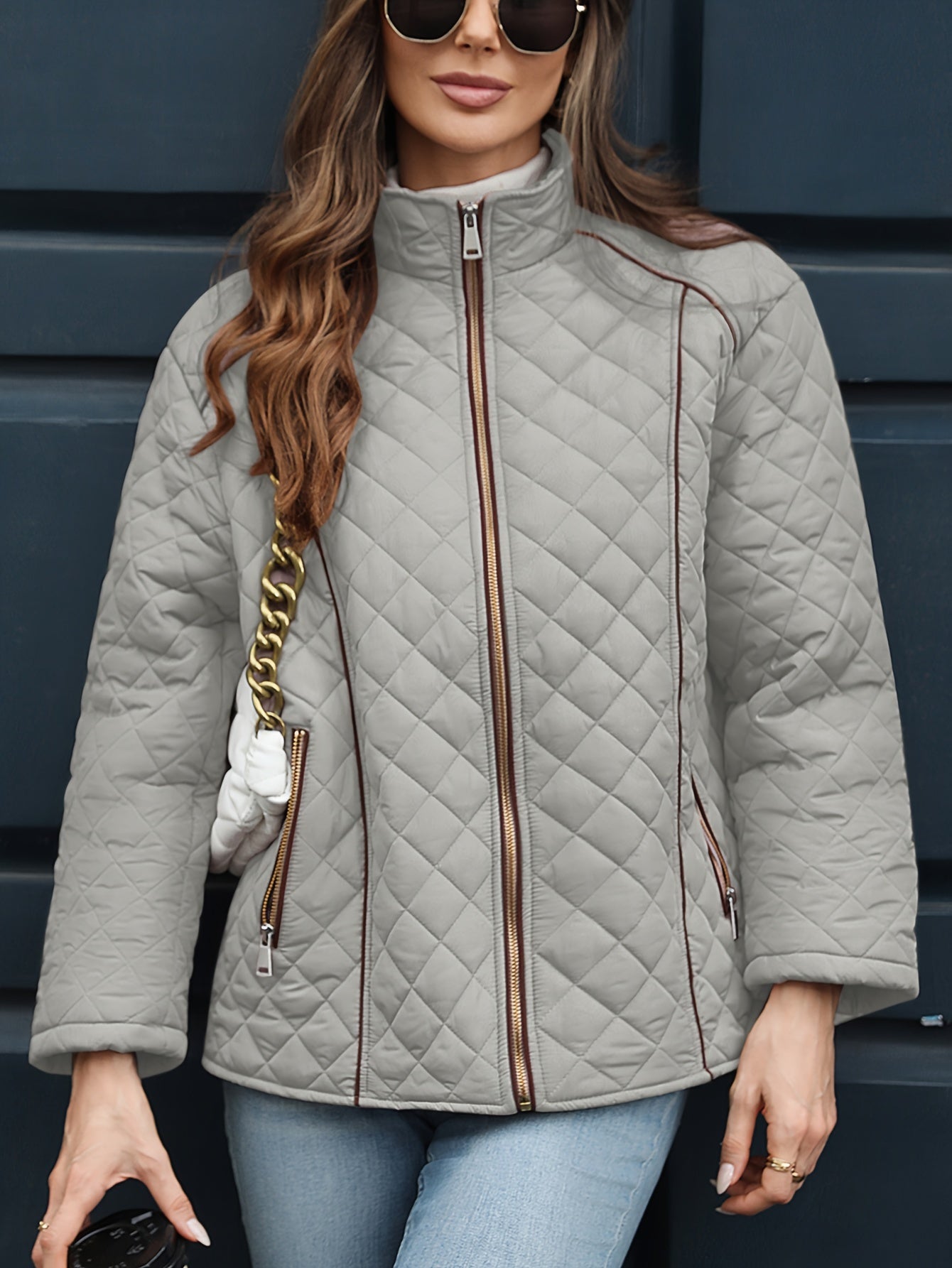 Women's plus size quilted jacket with zipper closure, polyester material, long sleeves, solid color, autumn/winter outerwear.