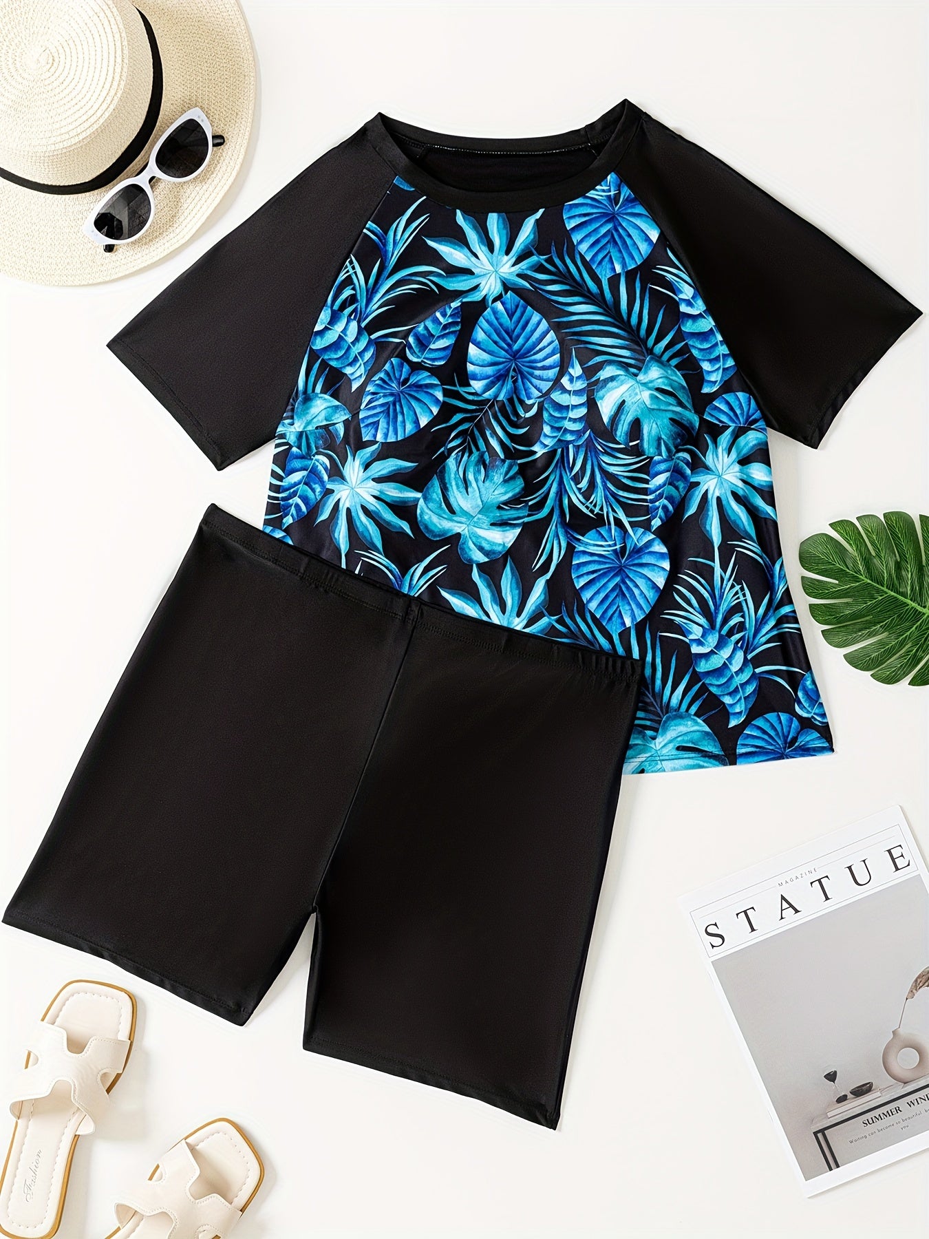 Stylish plus-size two-piece swimwear for women featuring short sleeves and boyshorts.