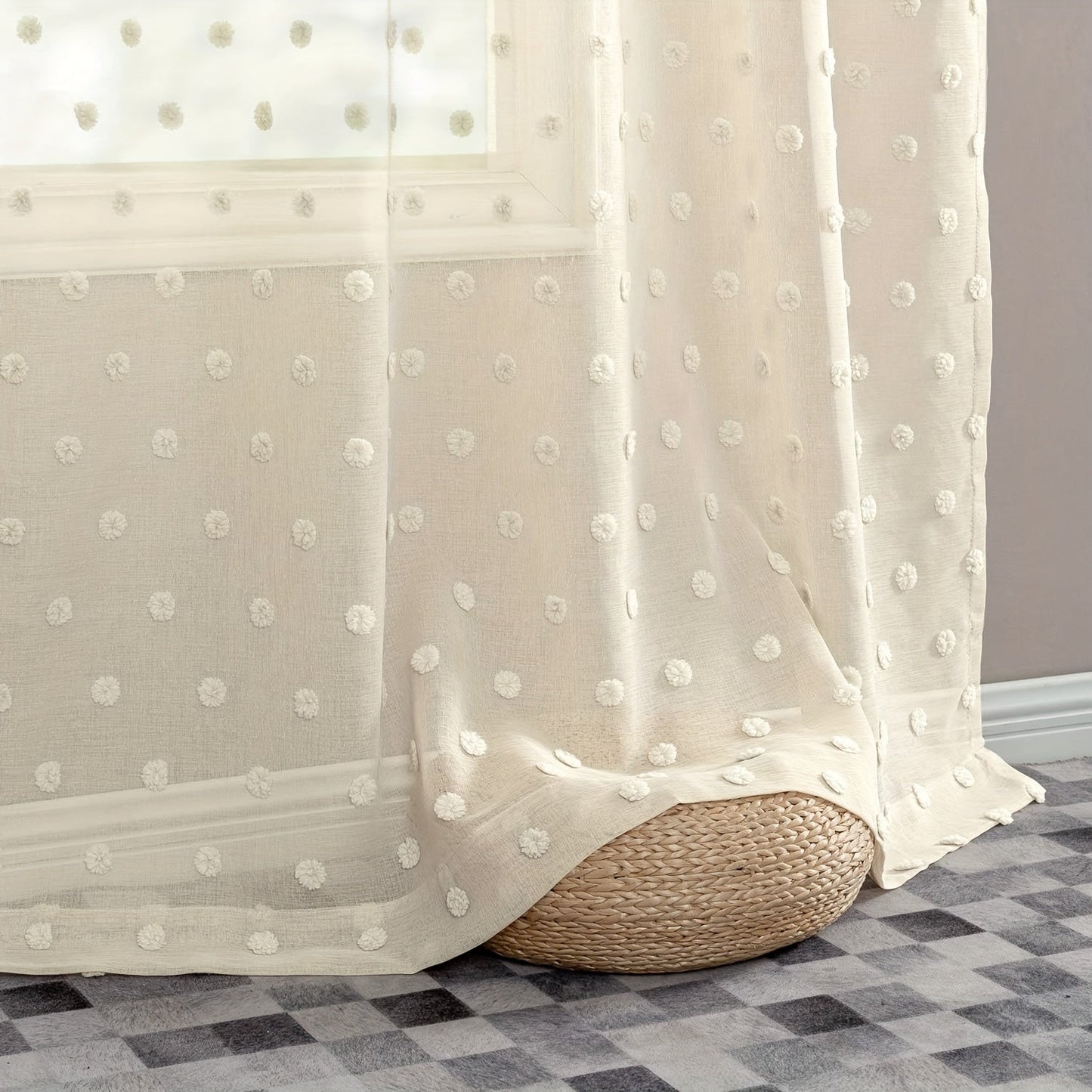 Sheer panel with rod pocket top featuring boho-style polka dot embroidery - crafted from imitation hemp fabric. This machine-washable drapery offers room darkening benefits for a variety of living spaces. With easy hanging and a fresh minimalist design