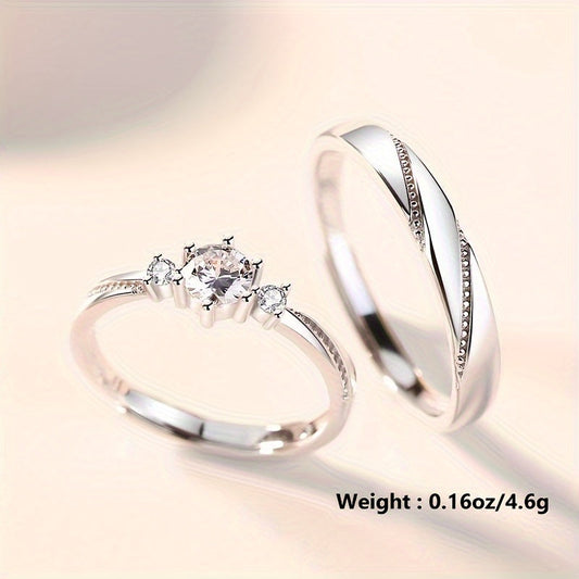 Set of 2 925 Pure Silver Couples Rings with Synthetic Zirconia, featuring 'Love at First Sight' design and openable ring. Each ring weighs approximately 4.6g. Perfect for engagement gifts or love tokens.