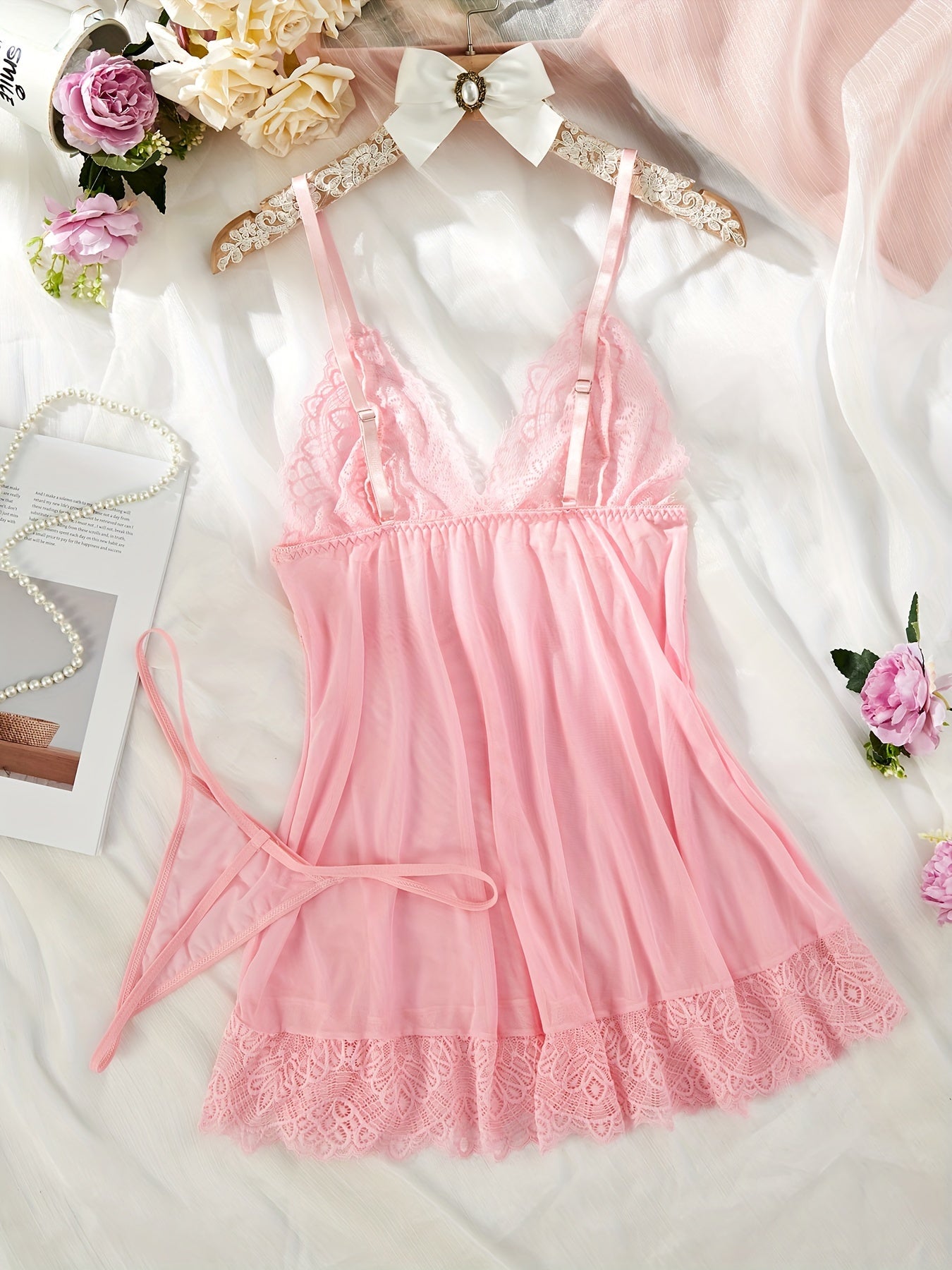 Pink lace nightgown set with satin bow detail, adjustable straps, and sheer boudoir vibe.