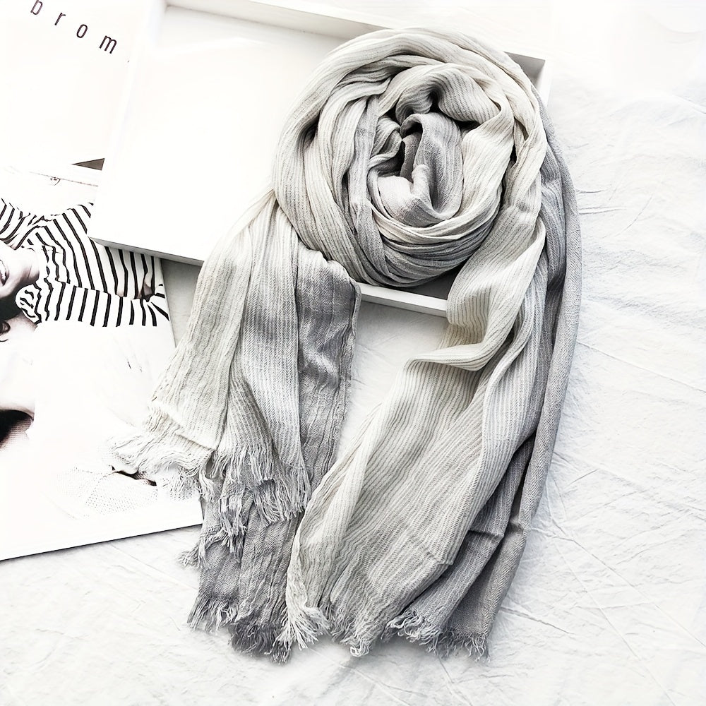 Elegance meets simplicity with our Classic Striped Tassel Scarf, the perfect fashion accessory.