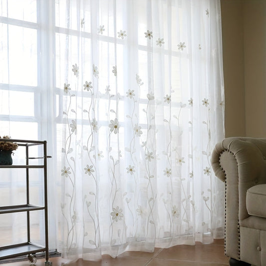 Sheer white curtains with floral embroidery, perfect for adding an elegant touch to your dining room or living room. These voile panels also work great as window drapes in the bedroom or sliding glass door, enhancing your home decor.