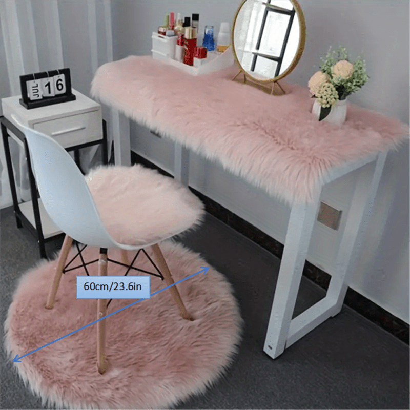 Soft and fluffy, this pink faux sheepskin fur area rug is perfect for adding a cozy touch to any room. Ideal for living rooms, dorms, bedrooms, nurseries, this shag rug is both stylish and practical. Easy to clean and great for placing under a dresser or