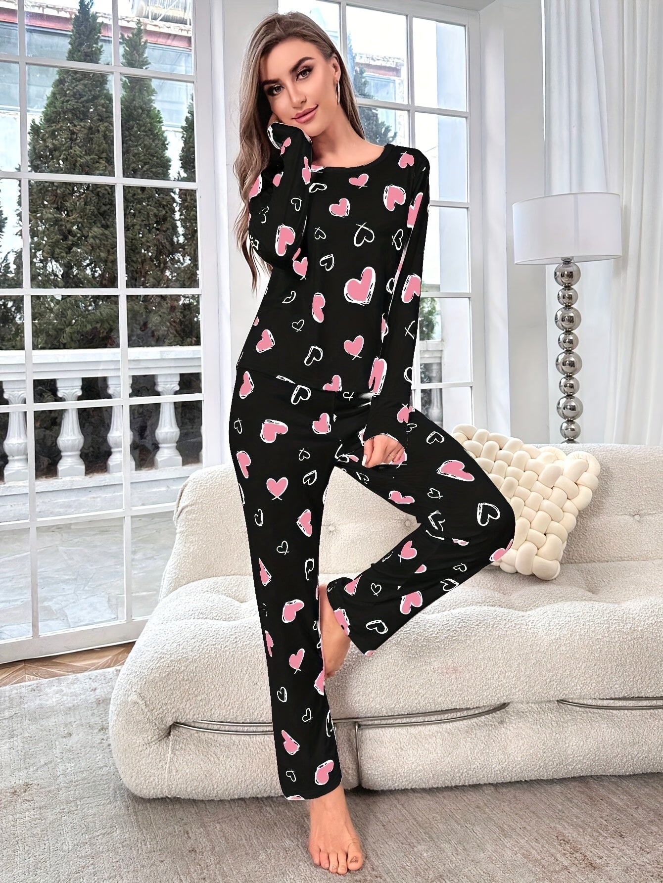 Heart print pajama set for women - cozy knit fabric with stretch - crew neck top and pants loungewear for all-season comfort.