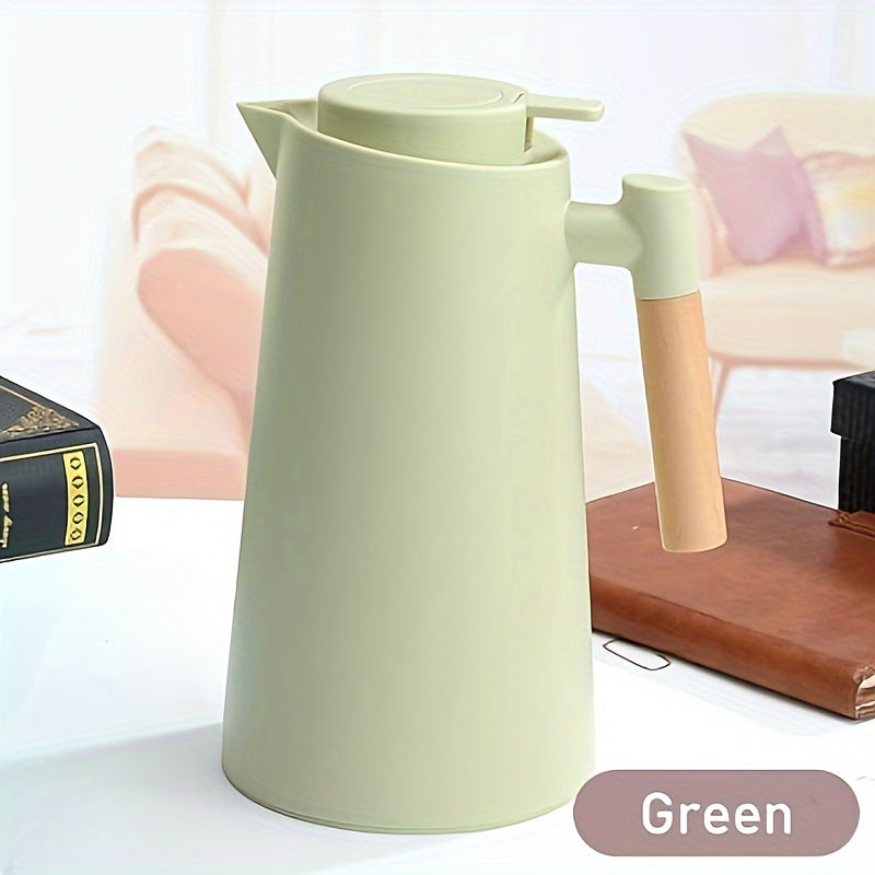 Dual-layer vacuum insulated coffee pot with wooden handle. Ideal for hot and cold beverages, requires no electricity.