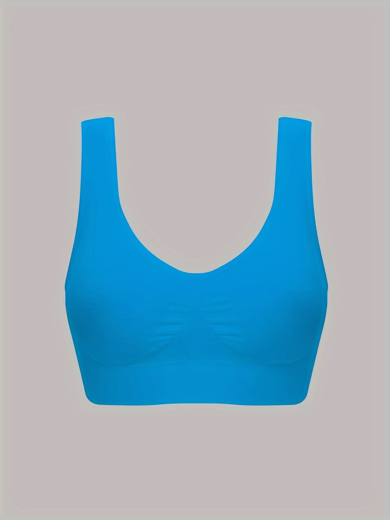 7 Women's sports bras made of wireless nylon knit fabric in solid colors. Breathable workout tank bra set made of 92% nylon and 8% elastane. A set of adult athletic underwear with bra and