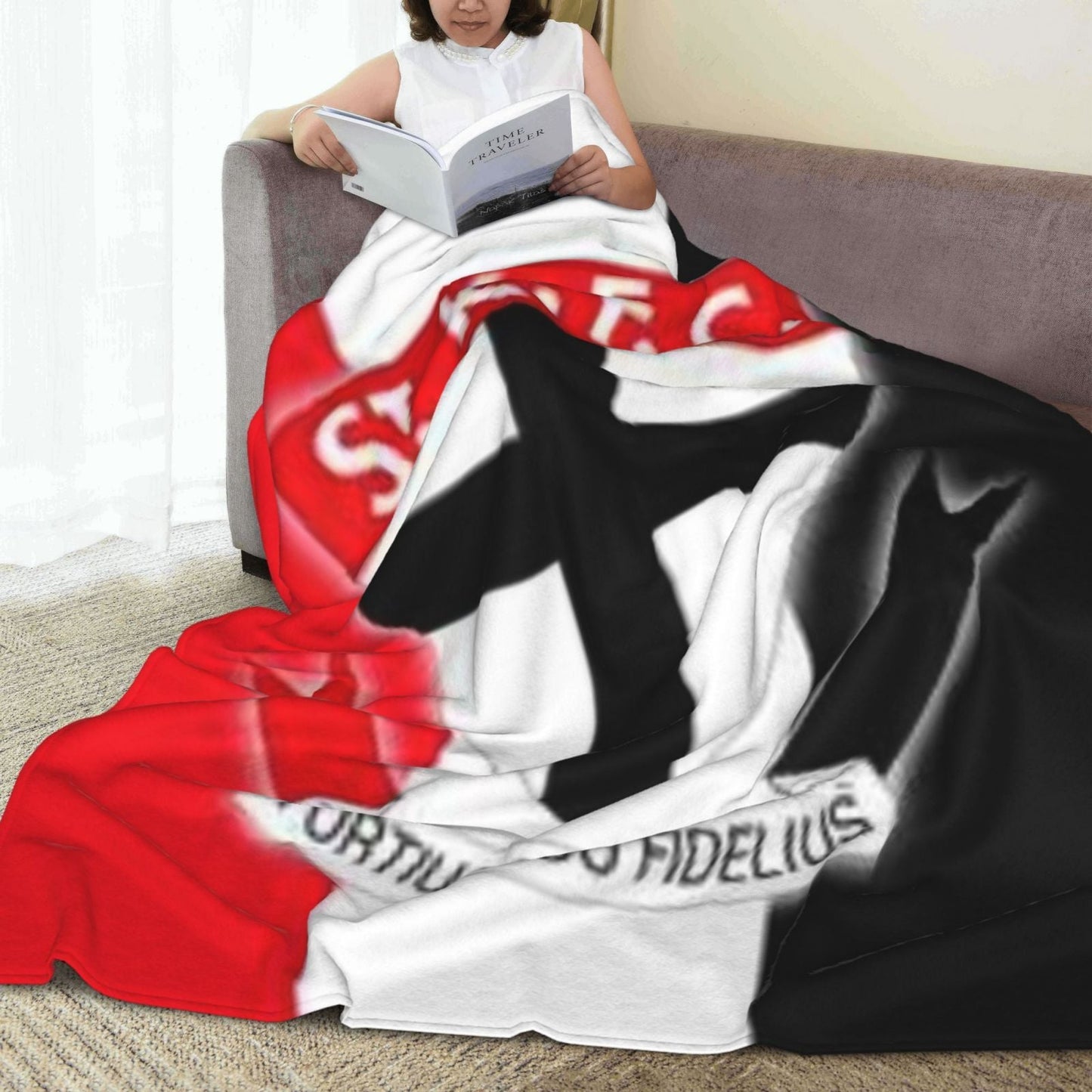 Stay warm and cozy with the St Kilda Australian Rules Football Club Printed Fleece Blanket. This soft and snug throw blanket is ideal for napping, whether on the sofa, in the office, on the bed, or while camping or traveling. It makes a versatile gift