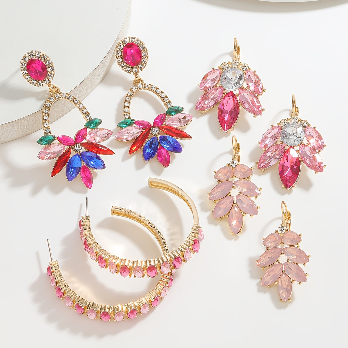 Shimmering pink floral and leaf earrings adorned with rhinestones - chic fashion accessory, made of gold-tone zinc alloy with stainless steel posts, perfect Valentine's Day gift for your girlfriend, suitable for all occasions and seasons.