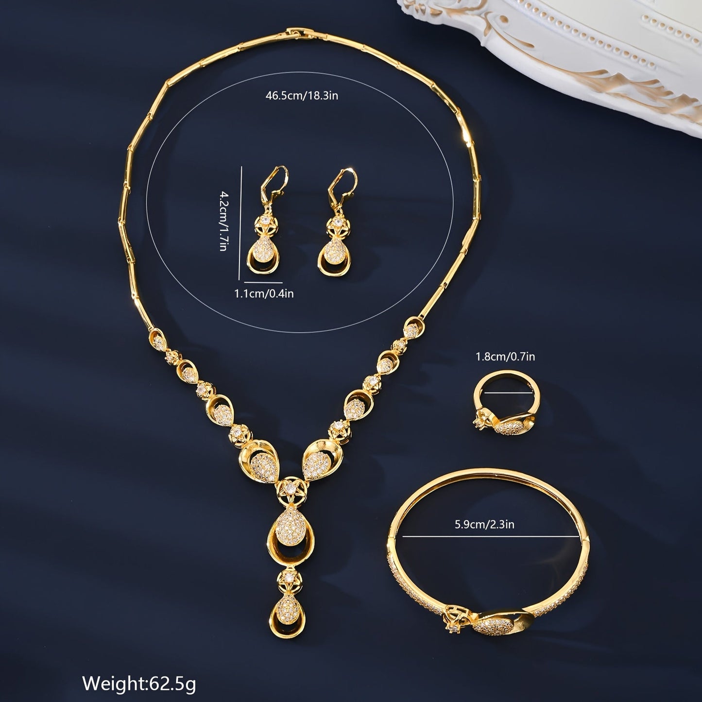 Exquisite 5-Piece Jewelry Set featuring 18K Gold Plating and Sparkling Zirconia Stones. This Set includes a Copper-Based Necklace, Earrings, Bracelet, and Ring perfect for Everyday Wear, Special Occasions, and as Gifts for Valentine's Day.