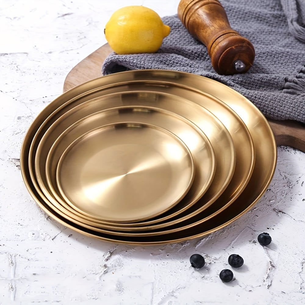 Round stainless steel dessert tray for elegant food presentation at various events. Ideal for weddings, birthdays, holidays.