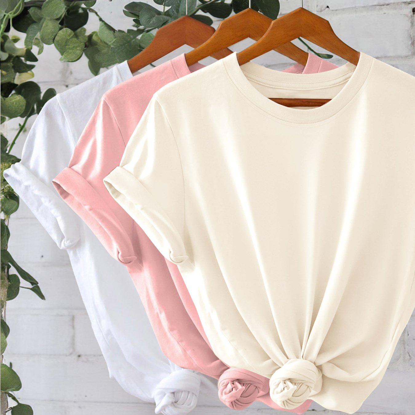 Set of 3 women's solid color T-shirts with short sleeves, crew necks, and knot detail, perfect for summer and spring. Machine washable and lightweight.