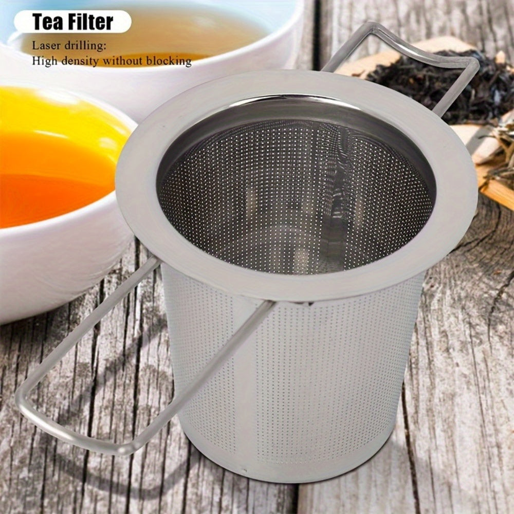 Tea infuser made of durable stainless steel for loose leaf tea, with lid and handle for convenient use at home, office, restaurant, or hotel. Features micropore metal strainer basket.