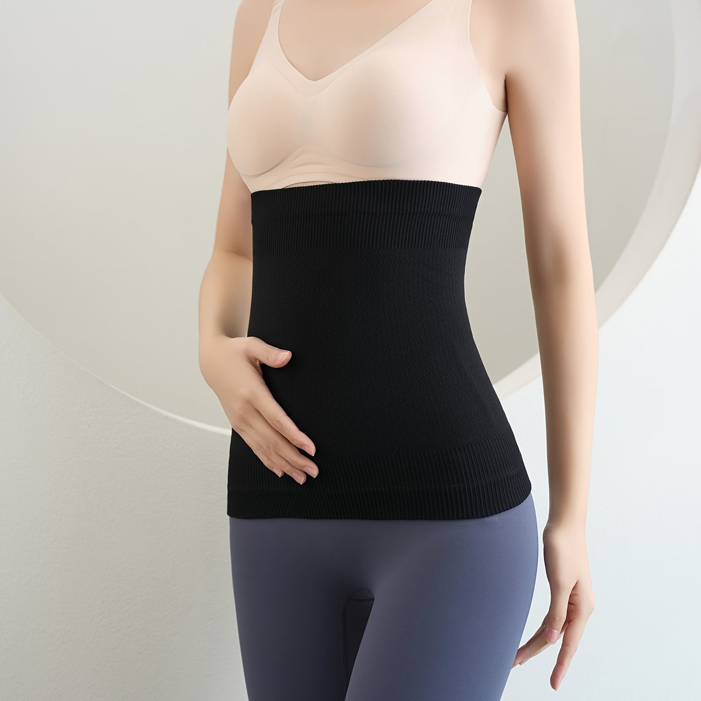 Seamless waist trainer for women, shapes and controls tummy.