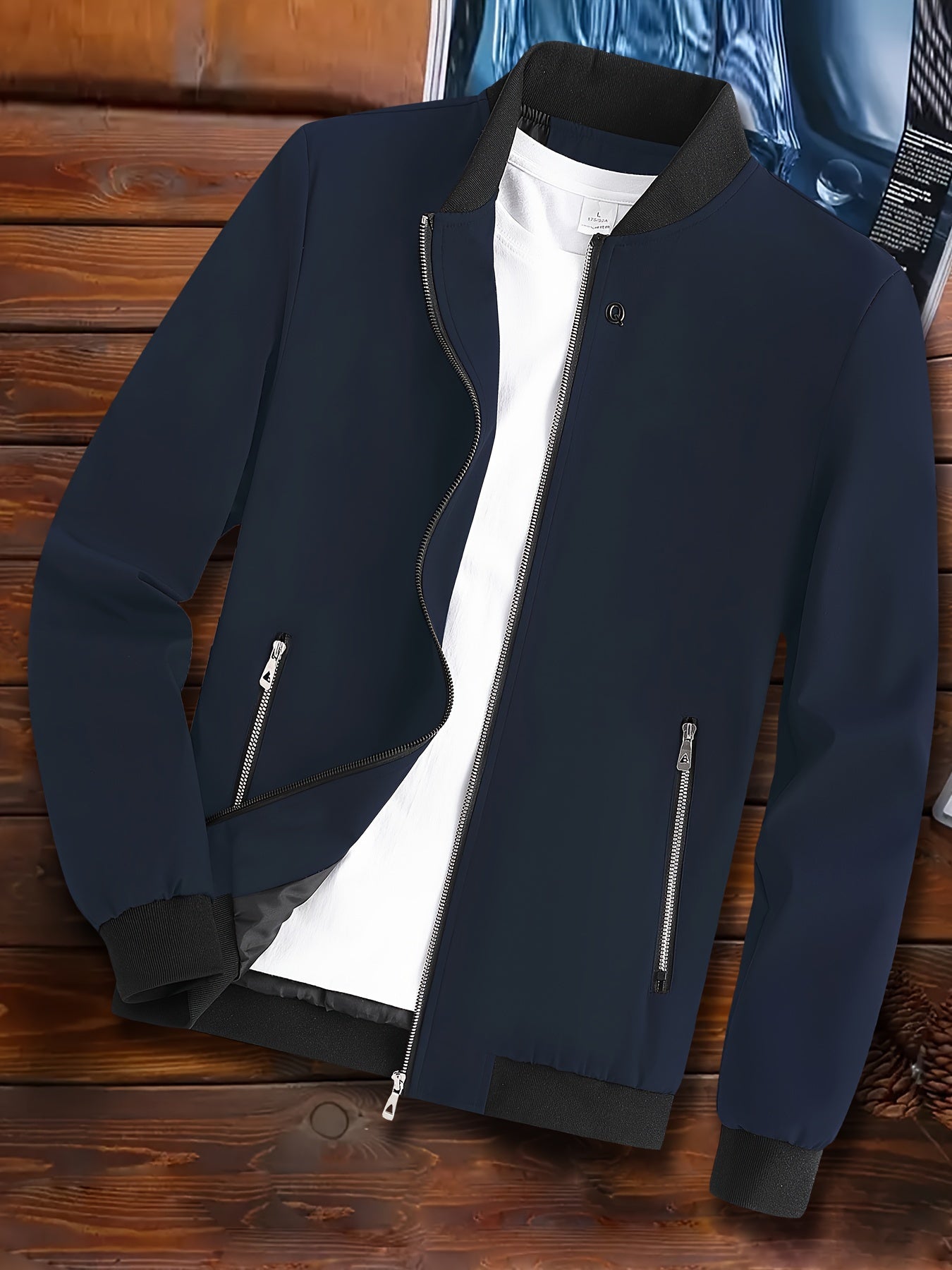 Casual men's windproof jacket with pockets for spring and fall, featuring a lightweight design and stand collar.