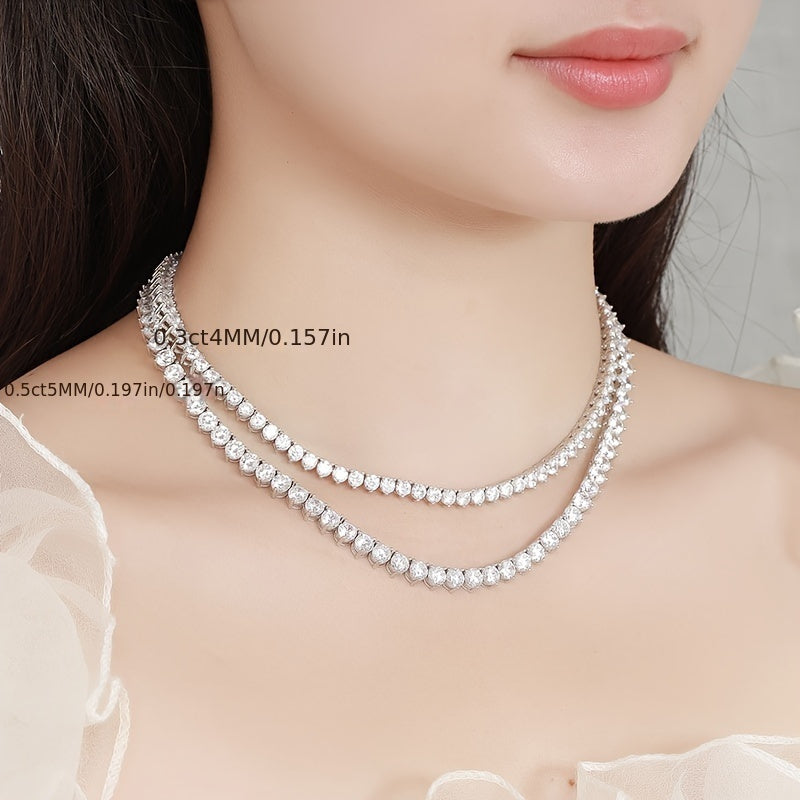 The Moissanite Tennis Necklace by Gems Lady features a 5mm stone set in S925 Sterling Silver with a unique Three-Claw Design. This elegant Clavicle Chain is perfect for all occasions including Engagement, Wedding, Anniversary, Mother's Day, Valentine's