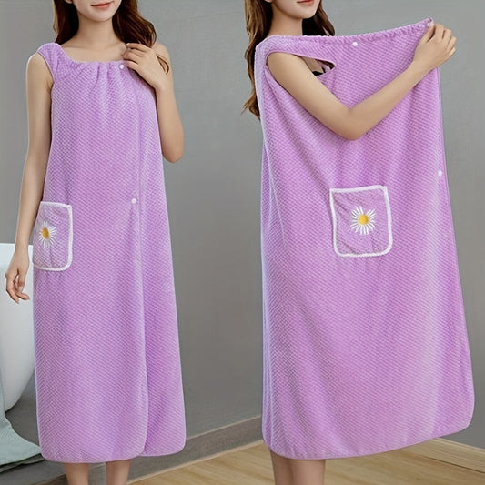 Adults' wearable bath towel features pockets, buttons, and quick-drying, absorbent material. Perfect for home spa or sauna use.