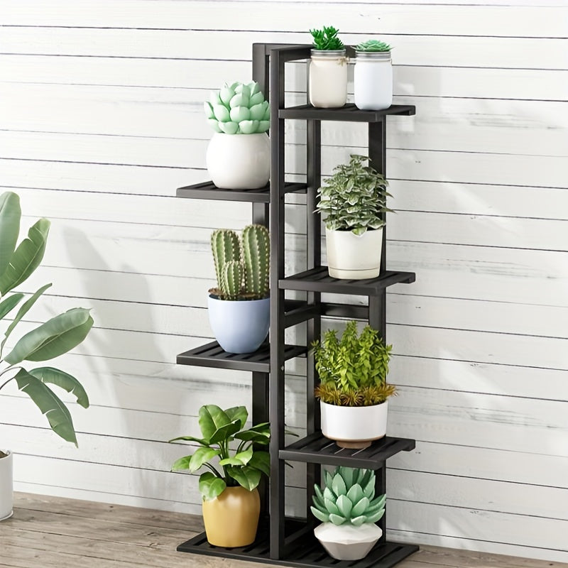 Stylish metal plant stand for indoor plants and flowers.