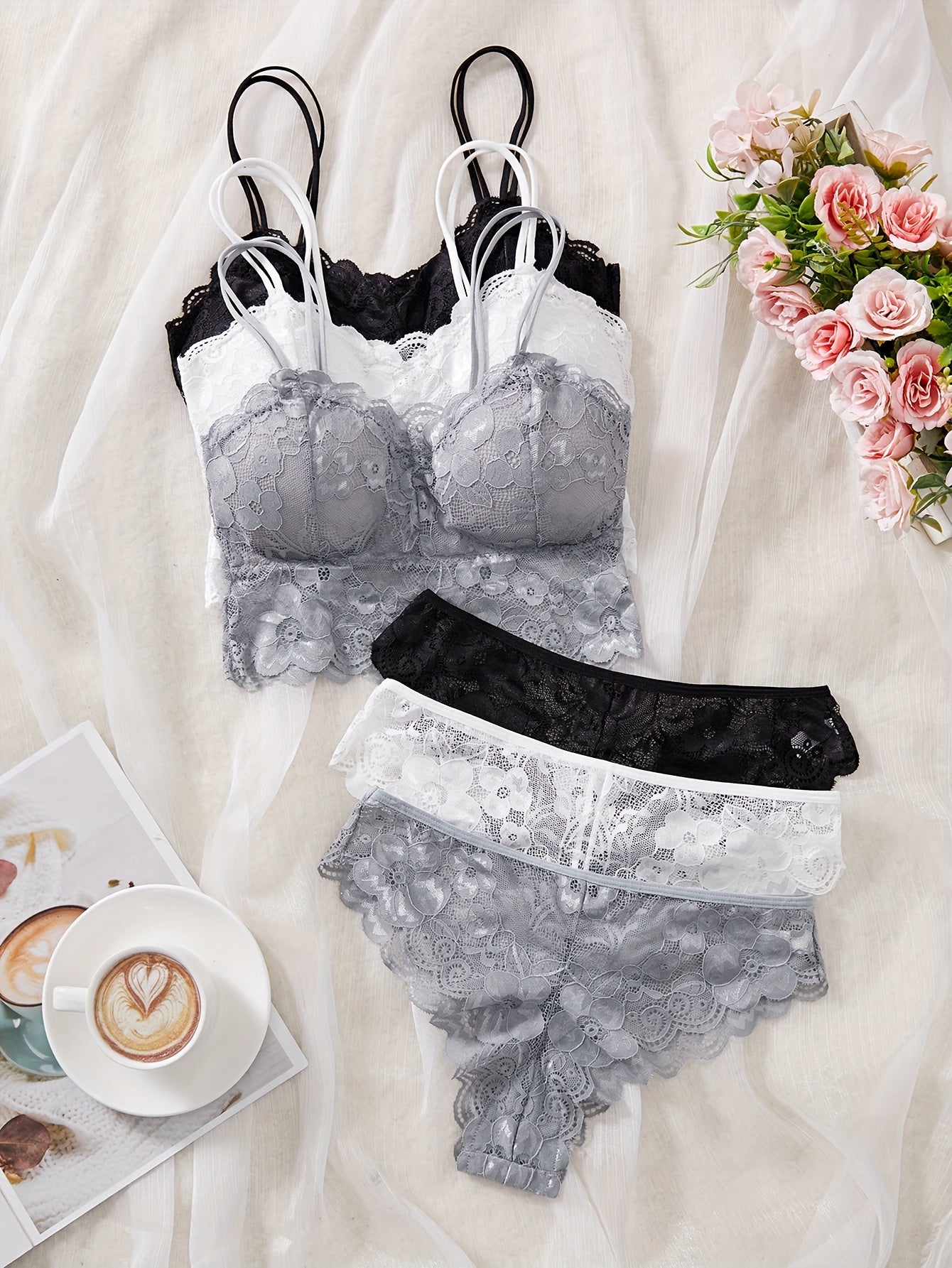 French lace bralette set with removable pads, low support, triangle thong, lace detail, solid color in black, white, or gray. Made of polyamide for adults.