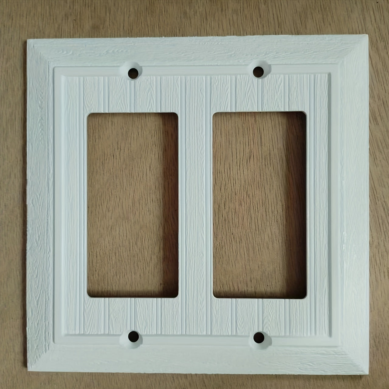 Decorative wall plates with retro wood grain design available in 1, 2, 4, or 10 pieces. Compatible with various switches and outlets.