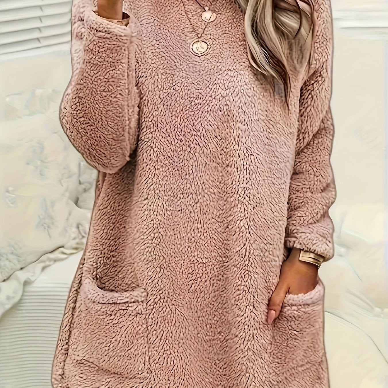 Cozy teddy fleece top for women, crew neck, long sleeve sweatshirt with pocket detail, perfect for fall/winter home wear.