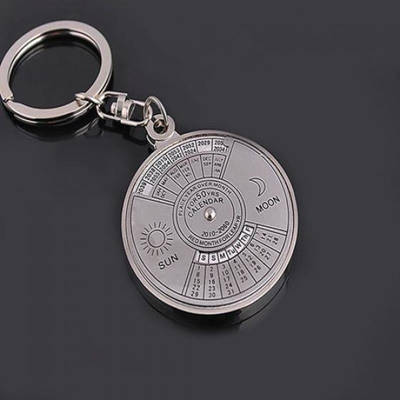 Perpetual calendar keychain with rotating compass. Unique gift for car keys.