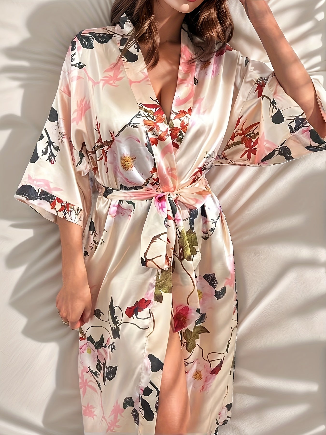 Lightweight polyester night robe with sleeve, deep V-neck, belt; machine washable for all-season comfort.