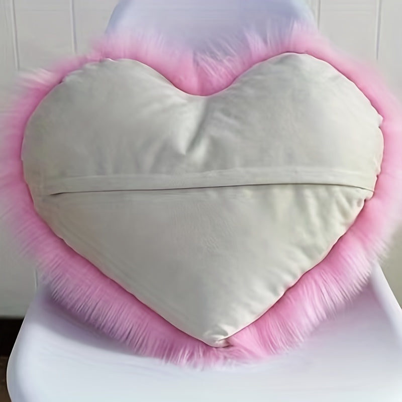 Heart-shaped throw pillow for living room or bedroom, made of long plush material for softness and comfort.