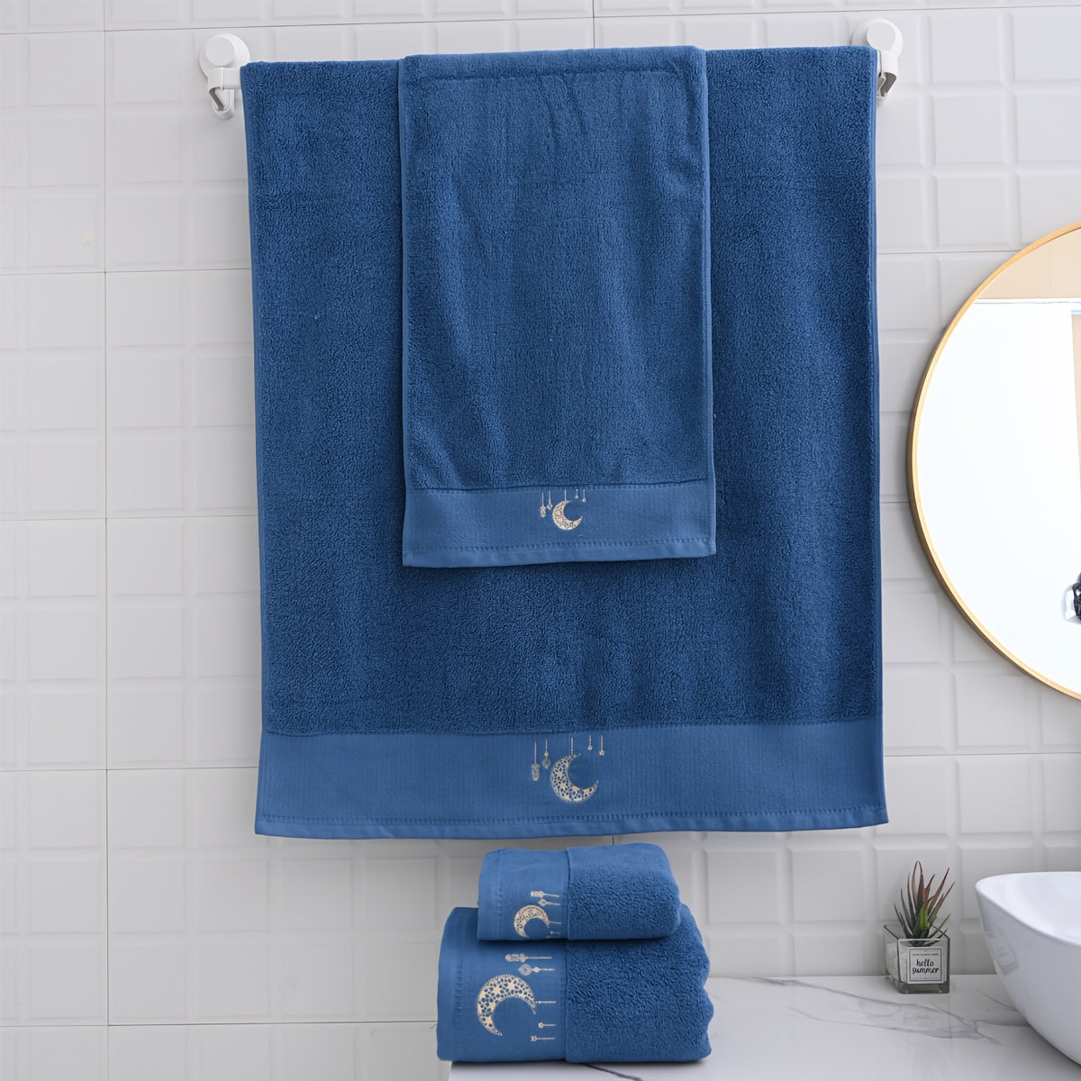 A set of 2 pure cotton velvet towels with star and moon embroidery in sizes 34*75cm and 70*140cm. Perfect for couples as a Valentine's Day gift or for general home use. Includes a washcloth and a beach/bath wrap.