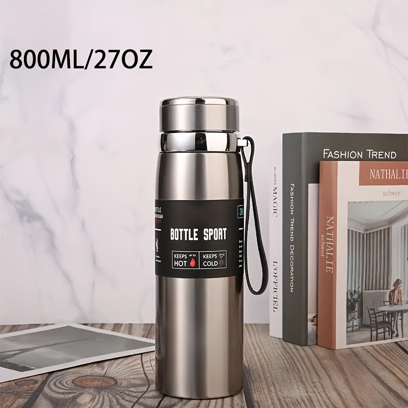 Stainless steel 1000ml vacuum insulated water bottle with portable strap, BPA-free, keeps hot/cold for sports and outdoor activities, hand wash only.