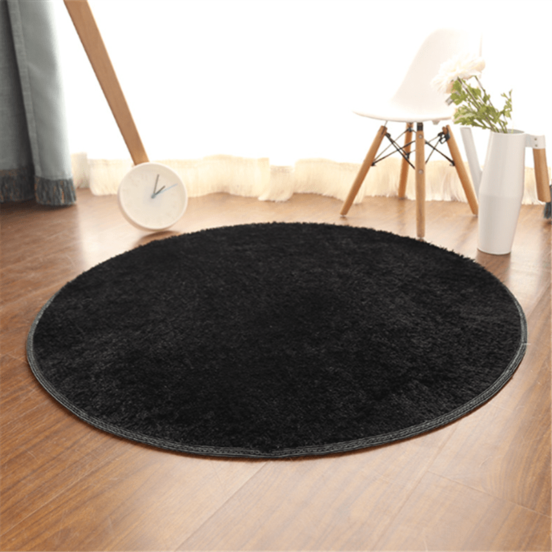 Soft, machine washable plush round area rug perfect for bedroom and living room decor - cozy and fluffy for maximum comfort.