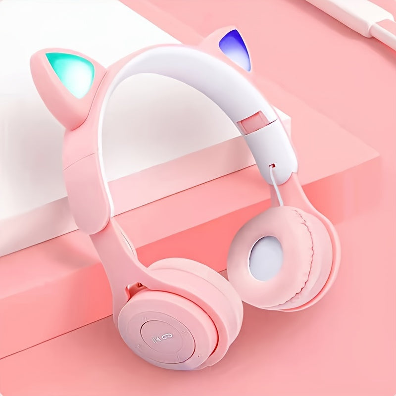 Wireless headset with foldable, luminous cat ears and colorful LED lights, perfect gift for birthdays, travel, and everyday use on tablets, computers, TVs, and cellphones.