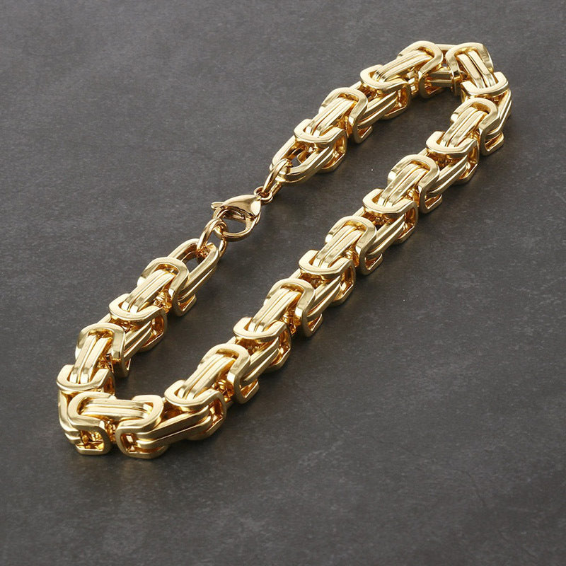 Stylish men's stainless steel chain bracelet in 8mm width, featuring a sturdy Byzantine box chain design. Available in black, golden, or silvery colors, this hip hop inspired bracelet is the perfect accessory for men looking to add some flair to their