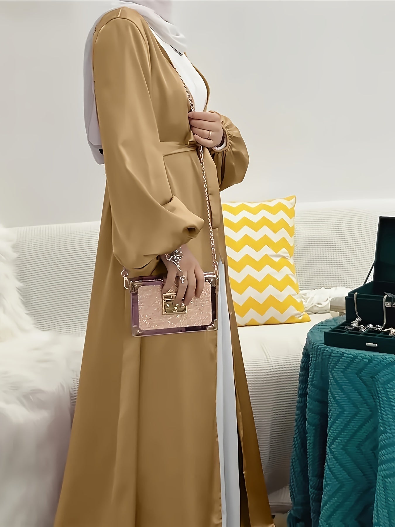 Long, elegant dress with puffed sleeves, slit hem, belt, and regular fit suitable for all seasons. Made of solid color, non-stretch polyester.