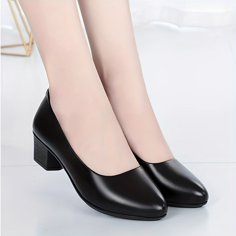 Elegant black faux leather work pumps with mid-height chunky heel, soft sole, and slip-on design for office and commuting.