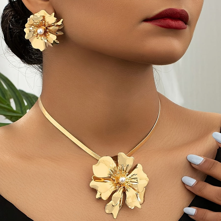 This exquisite 2-piece jewelry set exudes classic European sophistication. Featuring a luxurious golden metal flower pendant on a delicate snake chain necklace, paired with matching earrings, these elegant accessories are ideal for women seeking a touch