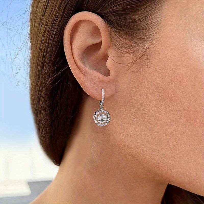 These Moissanite Smart Stud Earrings are crafted from 925 Sterling Silver and showcase a new fashion and elegant design. With a sense of luxury, these earrings are perfect for casual or classic occasions. They make a simple yet stunning gift for