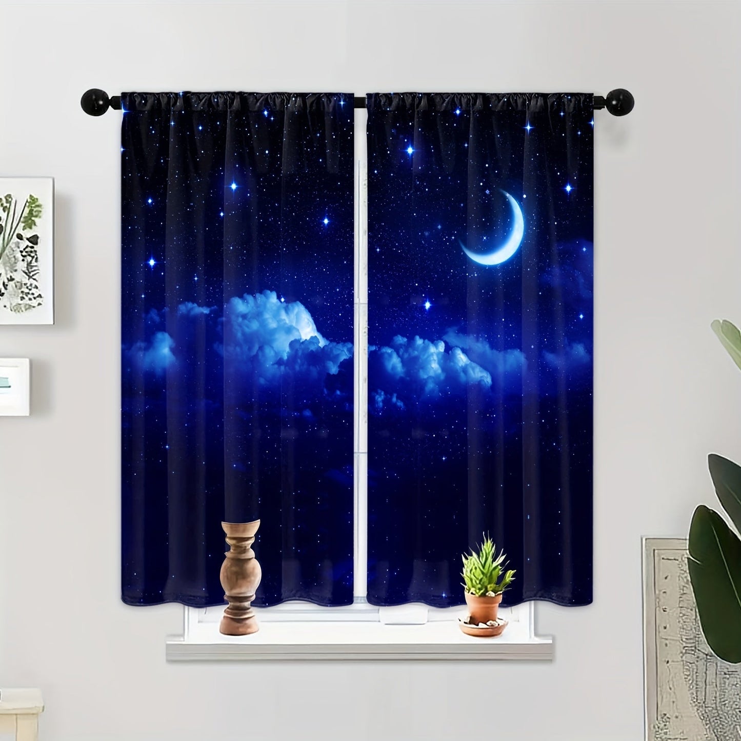 Two pieces of Galaxy-themed window curtains with a starry sky design. These rod pocket drapes are suitable for use in any room, including the kitchen, study, bedroom, living room, and playroom. They are made of soft and stylish fabric for a beautiful